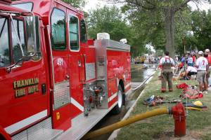 Sideline cheering From the sidelines, cheering on the teams.