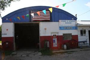 Stars and Stripes Garage front Patriotism shines at the Stars & Stripes Garage in rural Le Sueur County.