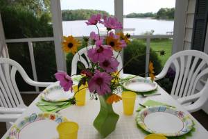 Summer table setting Debbie created a beautiful table setting using her favorite color, green, mixing and matching with pinks and yellows.