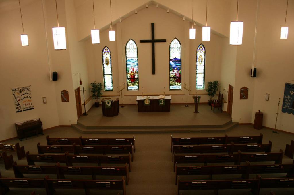 A view of Immanuel from the church balcony. The pews, the chancel furnishings and the stained glass windows from the old church were incorporated into the new church.