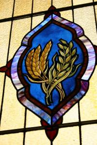 Grain window A side stained glass window features grain, reflecting the congregation's agricultural heritage.
