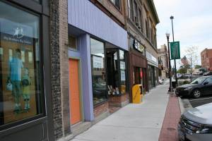Books on Central Half a block from the bakery, Books on Central sports new coats or purple and orange paint. Will this building be next on those pegged for a new paint job?