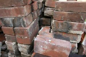 My son and I aren't brick layers, but we're trying to keep some order as we stack bricks on the driveway.