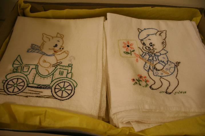 Embroidered dish towels were among silent auction offerings.
