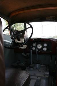 Inside the cab of the rare Minneapolis Moline UDLX, a comfort tractor that even included a radio, that box behind the steering wheel.