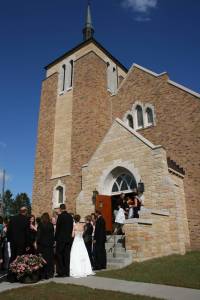 St. Elizabeth's Church Newly-weds Kristina and Corey greet well wishers outside St. Elizabeth's Church in Brennyville.