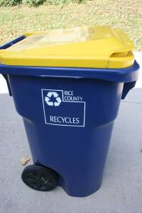 Recycling bin Personalizing, I can't stand the color of these government-mandated recycling bins, which clutter the Faribault landscape. I also don't like the blue color the city paints bridge railings. And once my neighbor painted her house a hideous bright blue. I have nothing against blue, but this simply illustrates that everyone prefers different colors. Now, if only we could take up a collection to buy say green recycling bins...