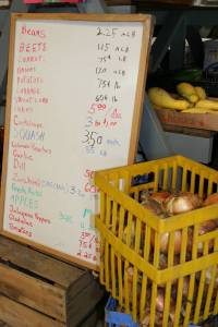 A white board lists produce available at Twiehoffs.