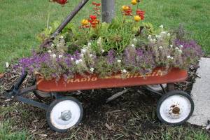 For the Feldman children, Emmalee and twins Owen and Cooper, a red wagon memorial.