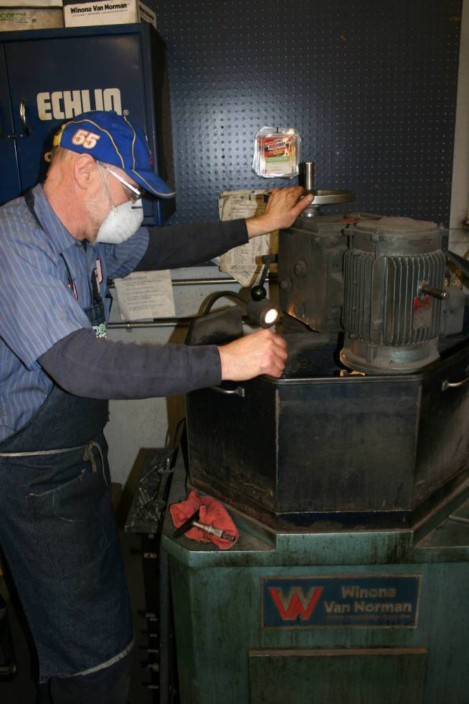 Randy grinds a flywheel.