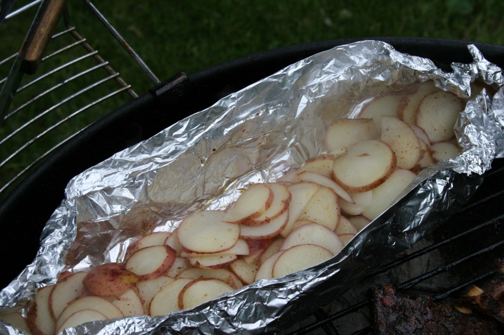 Fresh baby red potatoes on the grill