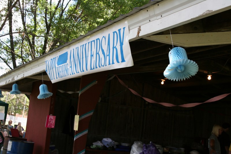 With the help of enthusiastic preteens, we decorated the park shelter and a screened tent with bells and crepe paper in honor of Jeff and Janet's 20th wedding anniversary.