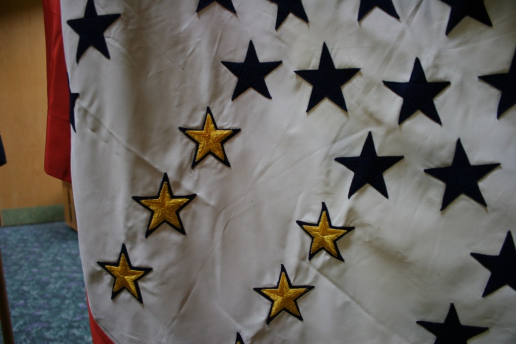 Yellow stars on WW II honor flag