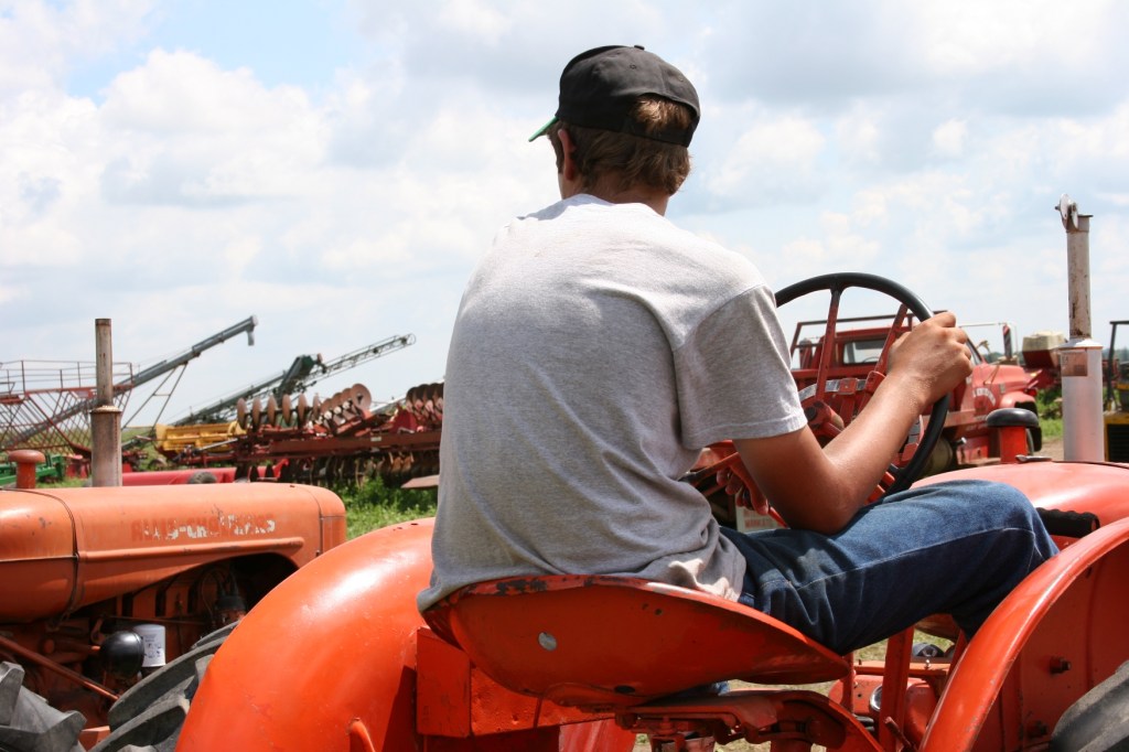 Young man on Allis Chalmers