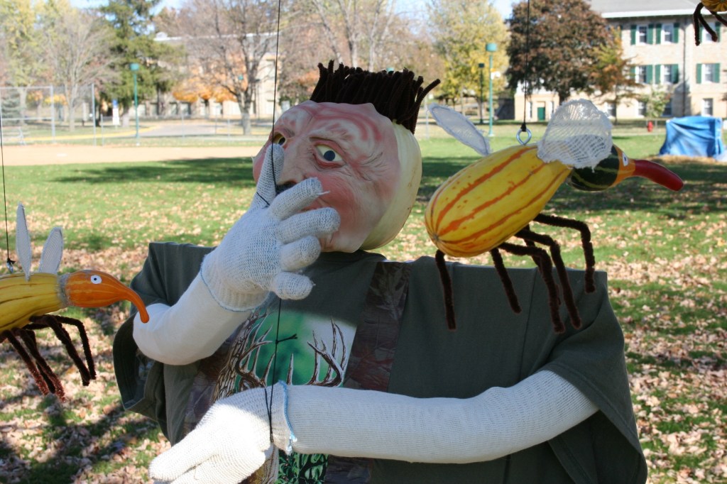 Scarecrow fends off mosquitoes