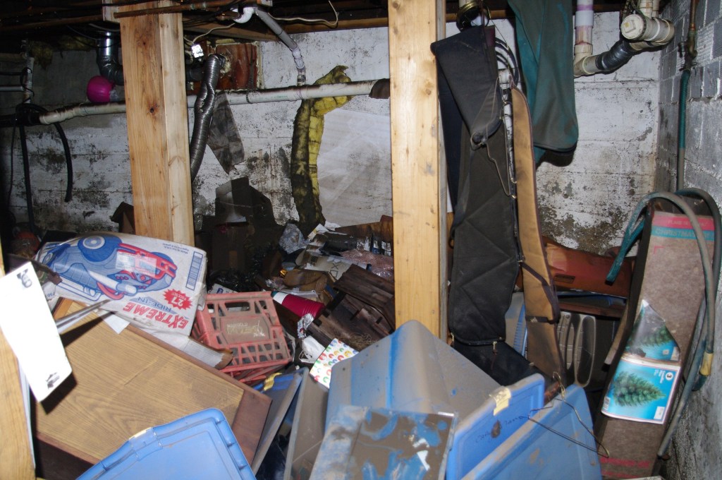Belongings in flooded basement