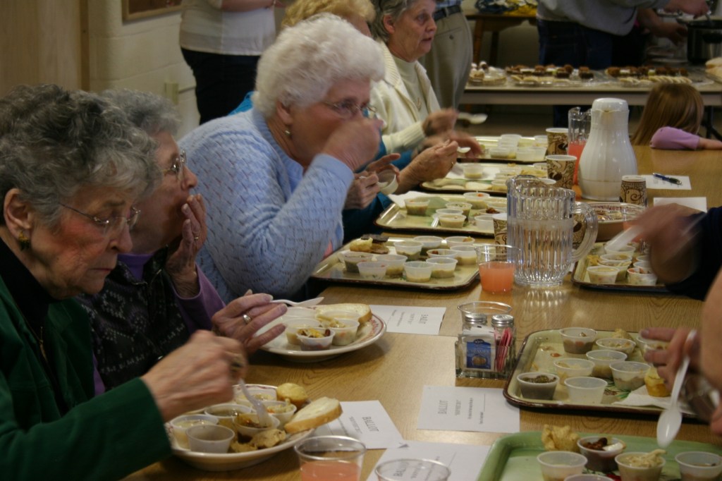 Diners tasting soup and chili
