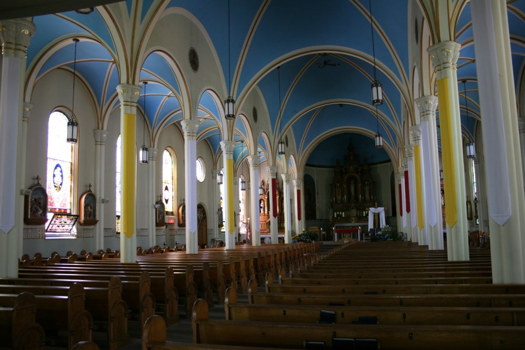 A view from the back of St. Mary's Catholic Church looking toward the main altar.