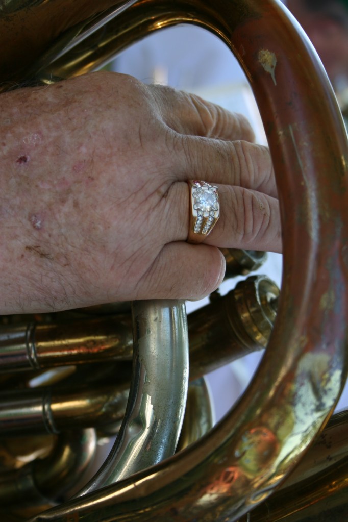 Lucan band, hand on tuba