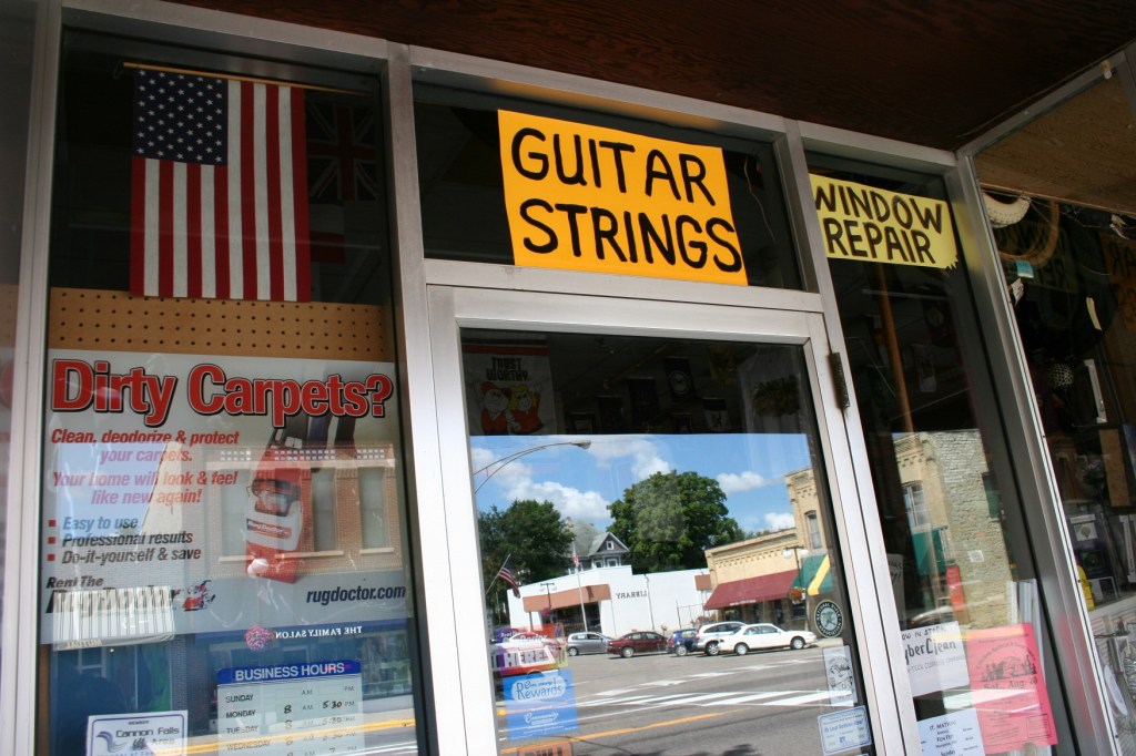 Obama, flag in window