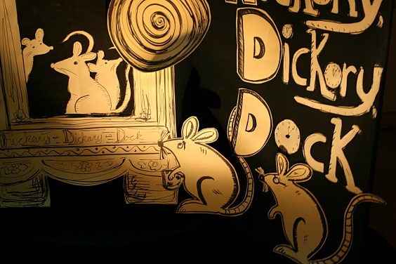 A close-up of art in the Hickory, dickory, dock rhyme.