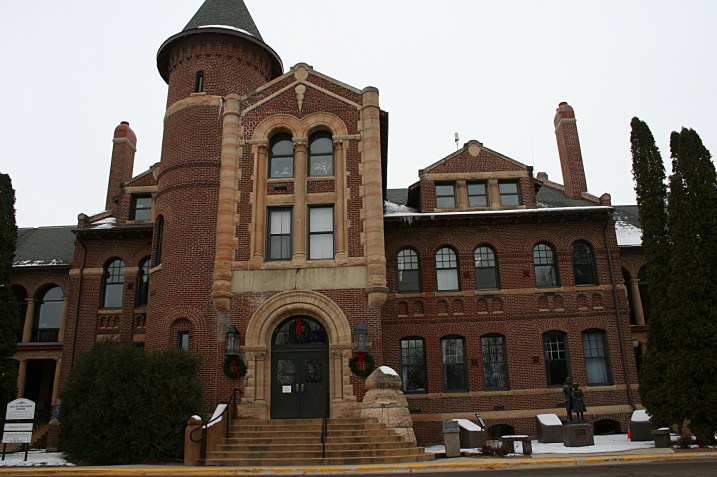 The main building at the orphanage, built in 1886, housed offices, a reception room, chapel/auditorium, boys' cottage, living quarters for employees, a sewing room, attic and linen storage. This main portion today serves as the Owatonna city administration building.