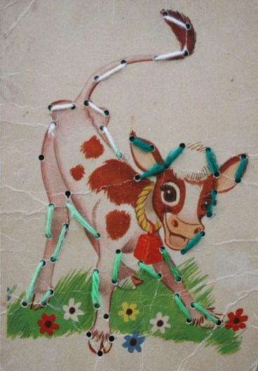 The calves I fed were black-and-white Holsteins smelling of barn.