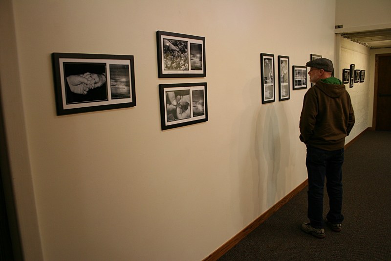 Viewing Kay Herbst Helms' photos in "What Sustains Us."