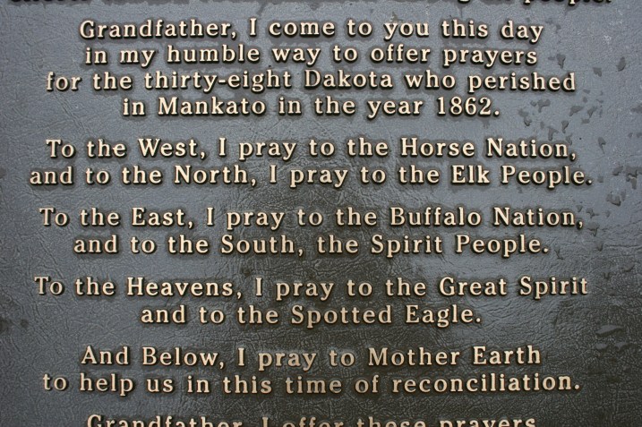 Words on a marker in Reconciliation Park in Mankato where 38 Dakota were hung on Dec. 26, 1862.