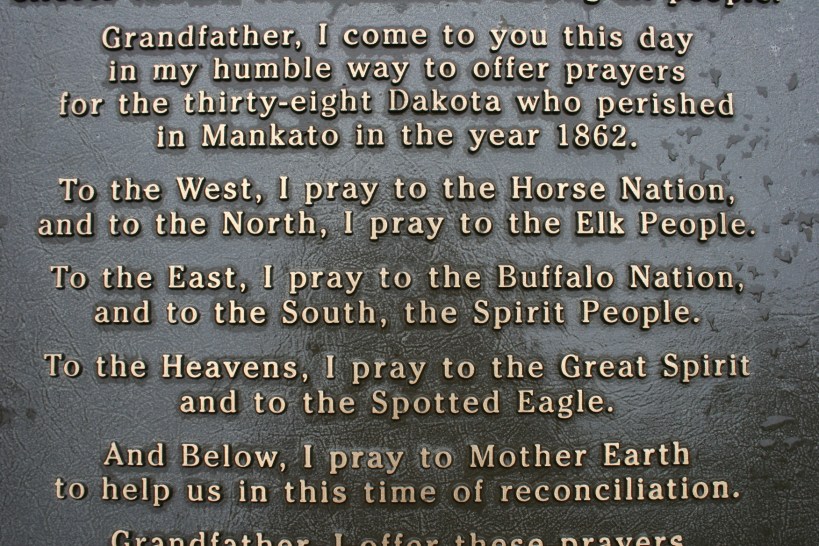 Words on a marker in Reconciliation Park in Mankato where 38 Dakota were hung on Dec. 26, 1862.