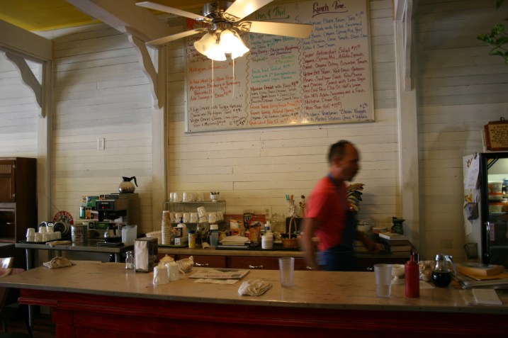 Highland Cafe, Troy behind the counter
