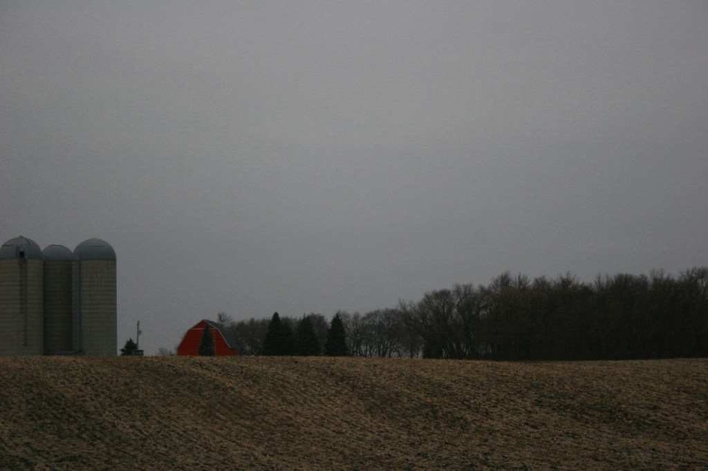 Drive, barn behind hill