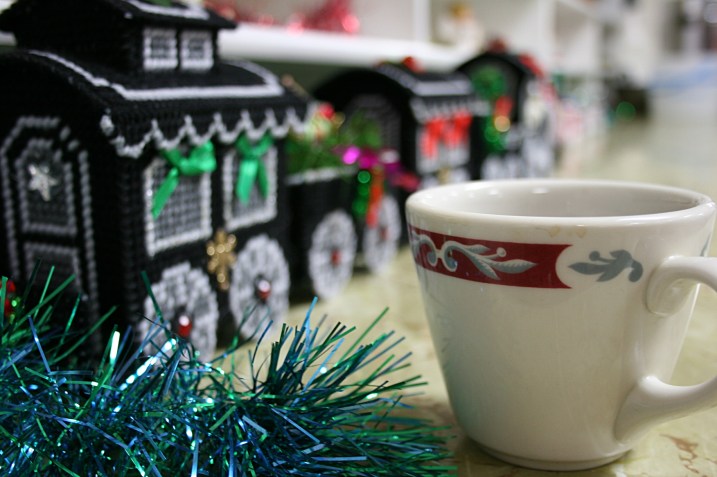 I noticed this full coffee cup setting on a cupboard lined with holiday decorations. During the congregation's Lenten soup luncheons, desserts fill the shelves.
