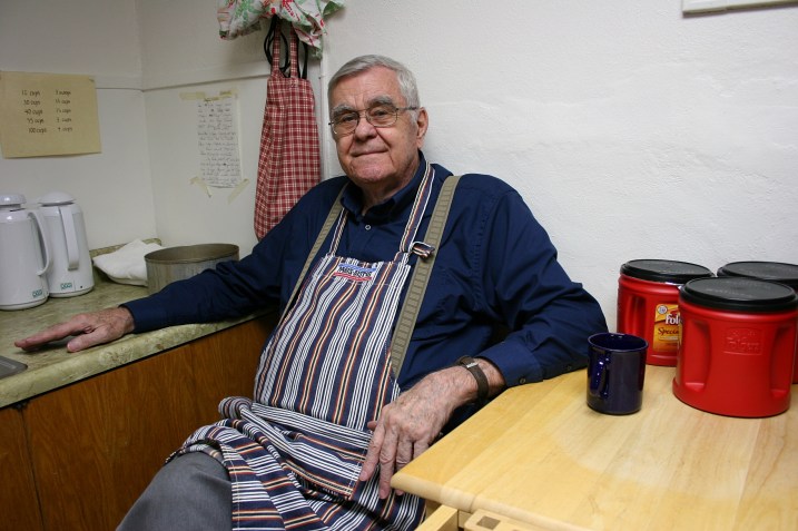 Coffee maker Dan Tersteeg mans the coffee corner. The coffee makers always use Folgers coffee, he says, because it works best with Faribault's water.