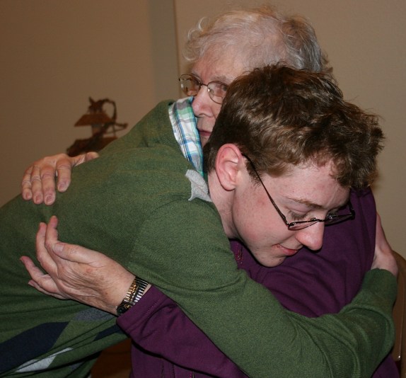 One of my favorite candid shots, my son embracing his grandma, whom he had not seen since July Fourth.