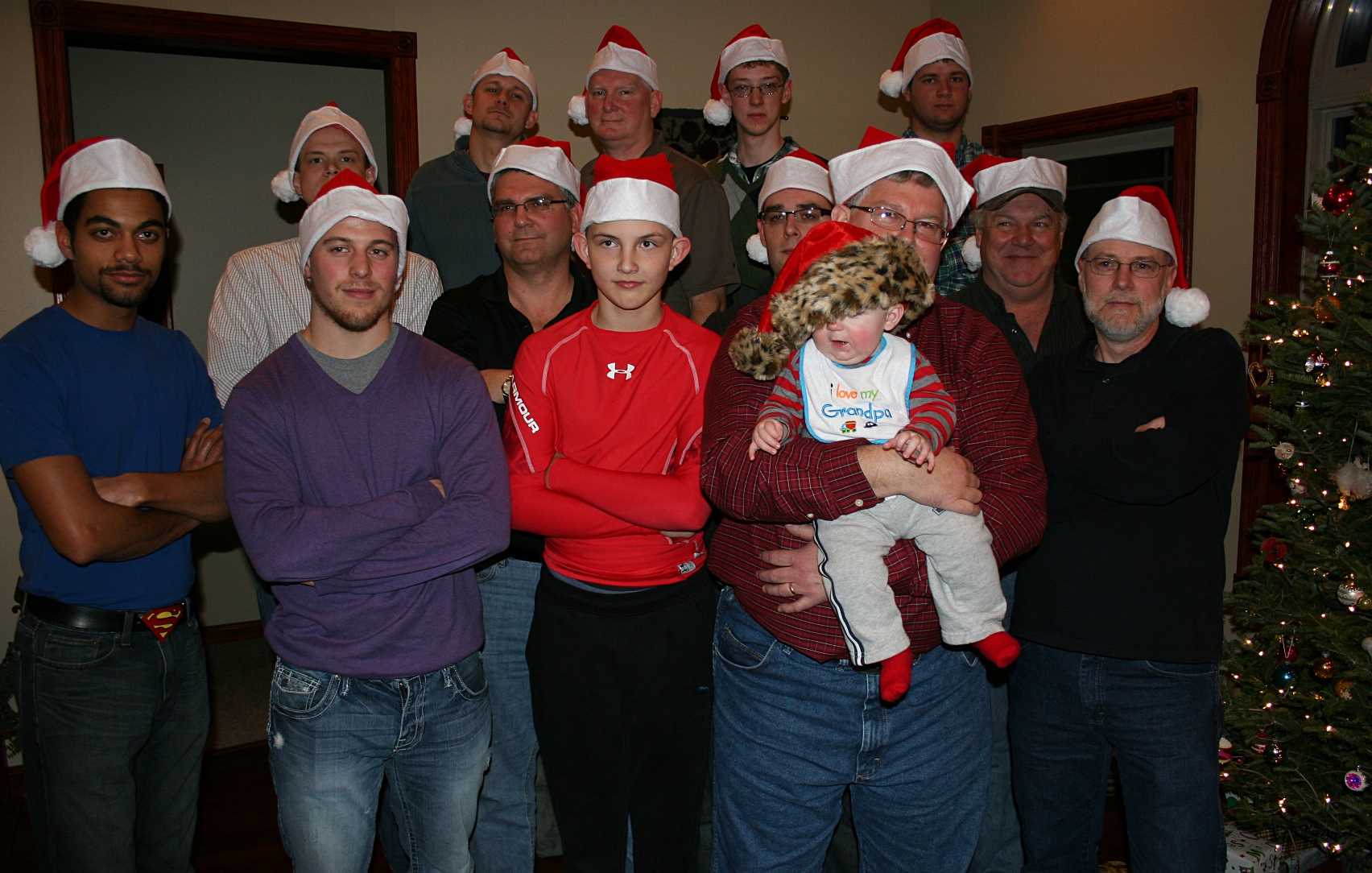 I decided the men needed hats, too, so I brought Santa hats for them to model in a serious pose.