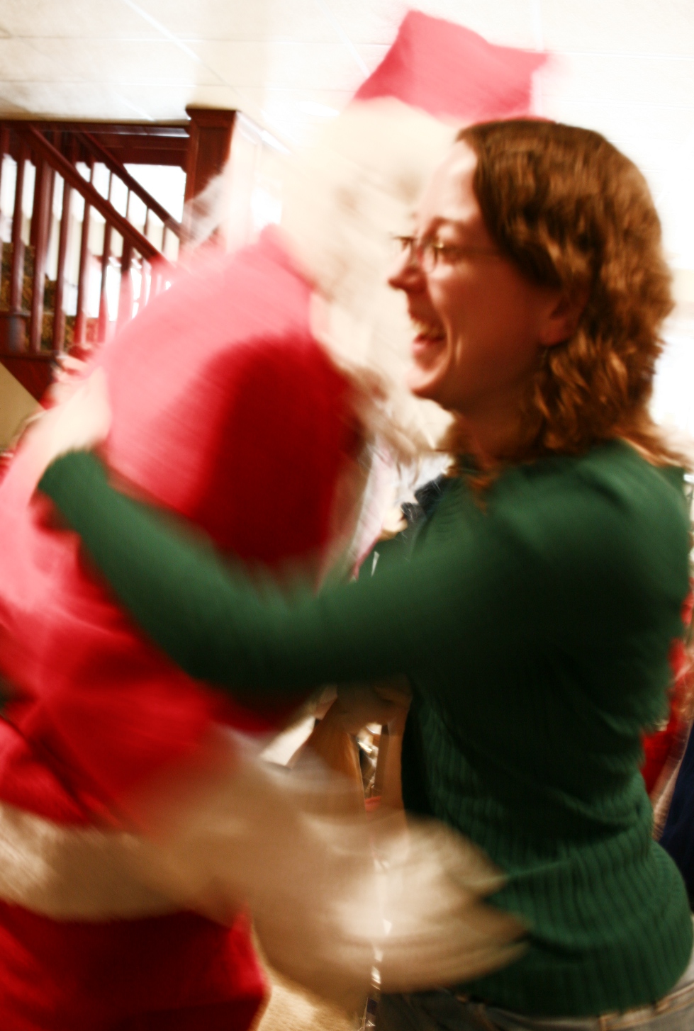Santa shows up every year at the family Christmas. Here he hugs my second daughter. He handed out cans of SPAM to me and my siblings apparently to celebrate all the SPAM we consumed as children.