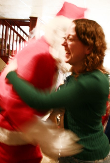 Santa shows up every year at the family Christmas. Here he hugs my second daughter. He handed out cans of SPAM to me and my siblings apparently to celebrate all the SPAM we consumed as children.