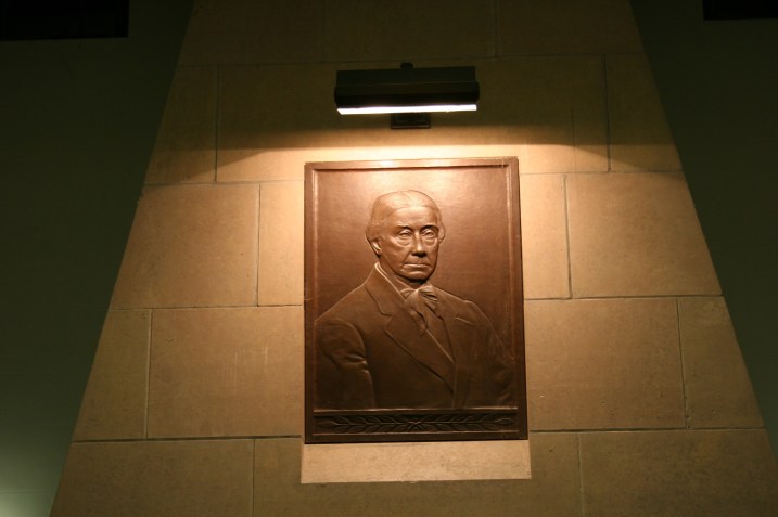 I believe this is a bust of Judge Thomas Scott Buckham, after whom the library is named. His wife, Anna, gifted the city of Faribault with this Art Nouveau/Greek Revival style building constructed in 1929-1930. The bust is located above the fireplace in the Great Hall, right behind where Peter and I presented.