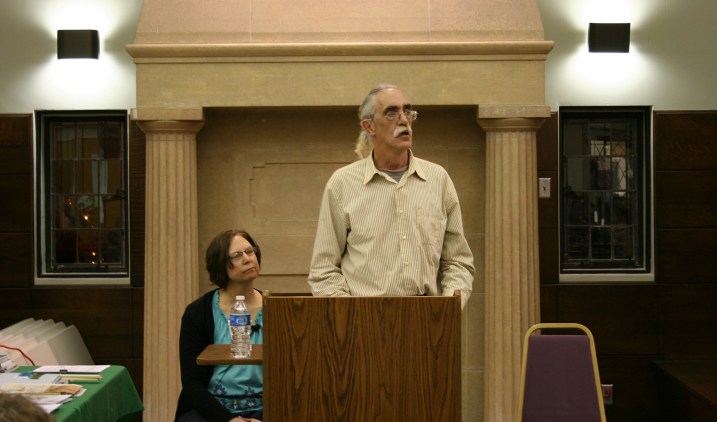 Peter Allen presented with me Thursday evening at the Faribault library. I handed my camera to my husband and he tried to get some decent shots shooting available light. This one is the best.. And, no, I am not not sleeping. I'm either contemplating Peter's poem or glancing at my script. Photo by Randy Helbling