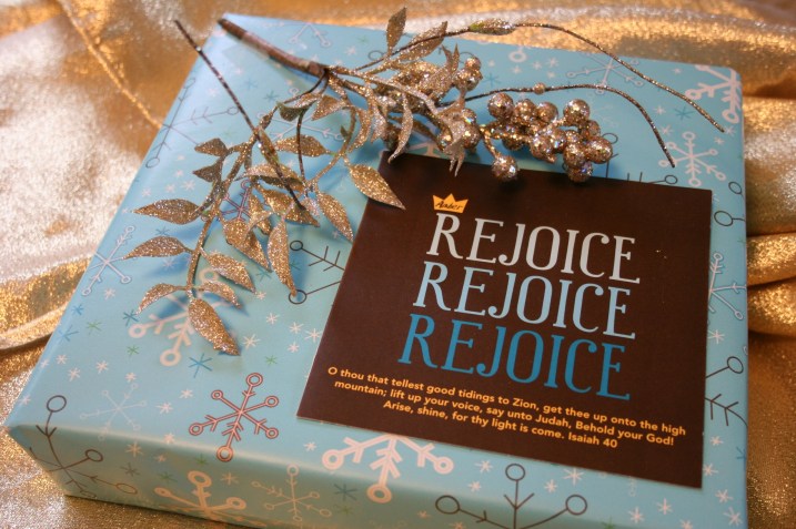 I used festive holiday trim and a card from Christmases past to decorate this gift.