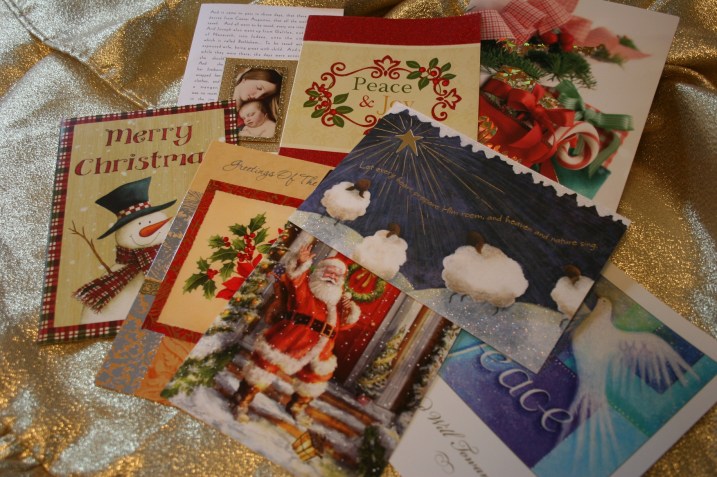 Examples of Christmas cards in my stash that could be recycled into gift tags.
