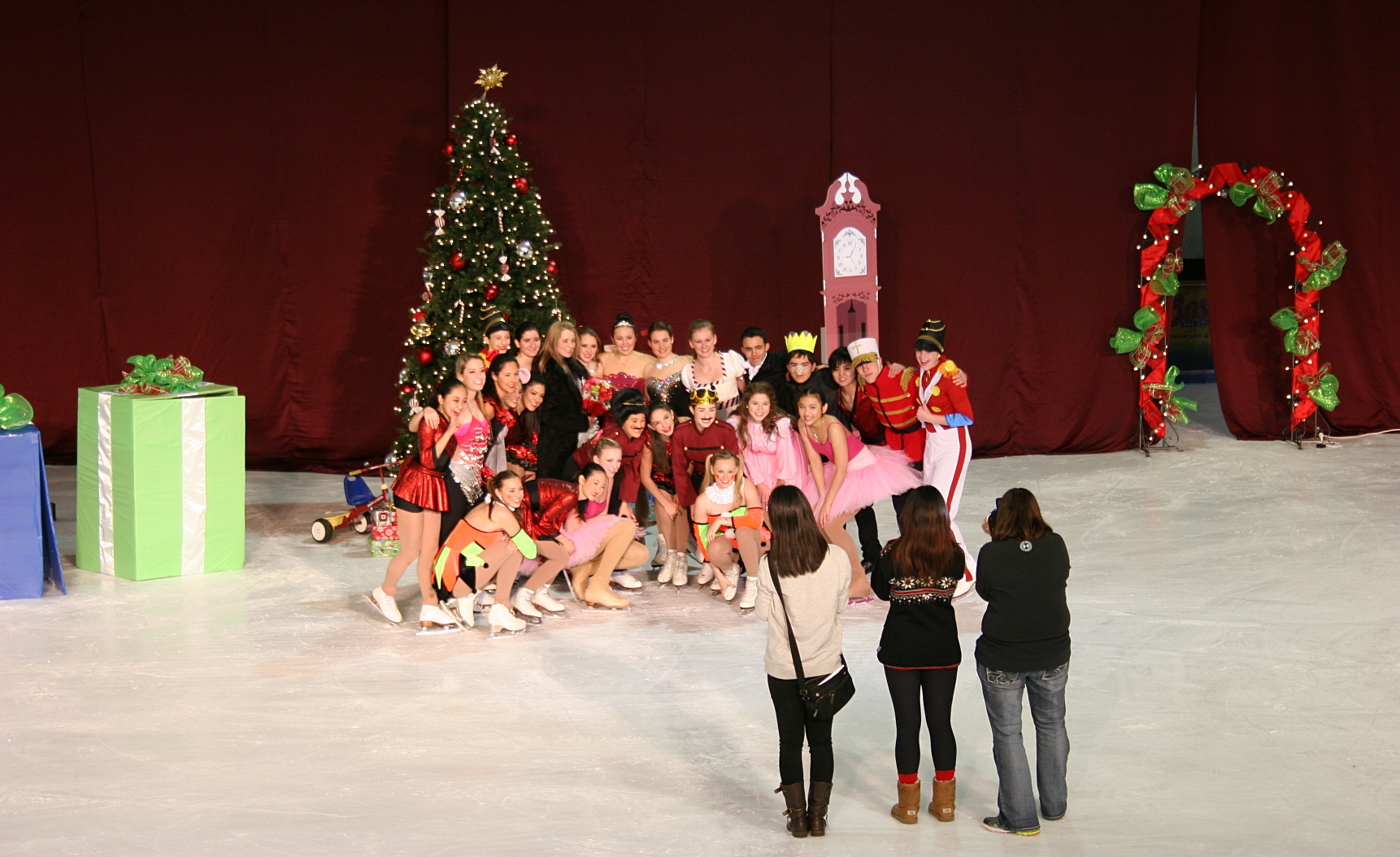 The skaters pose for post performance photos.