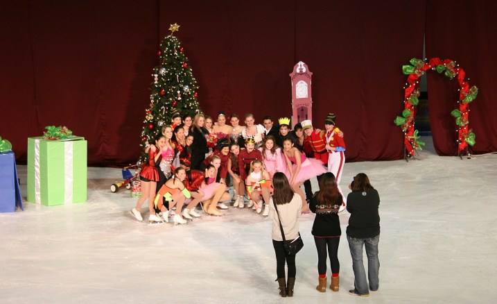 The skaters pose for post performance photos.