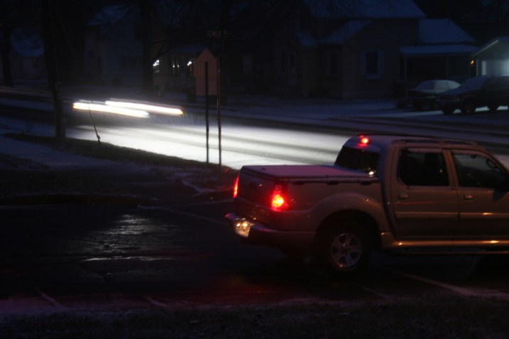 Still waiting for traffic to pass on a main arterial street past my house.