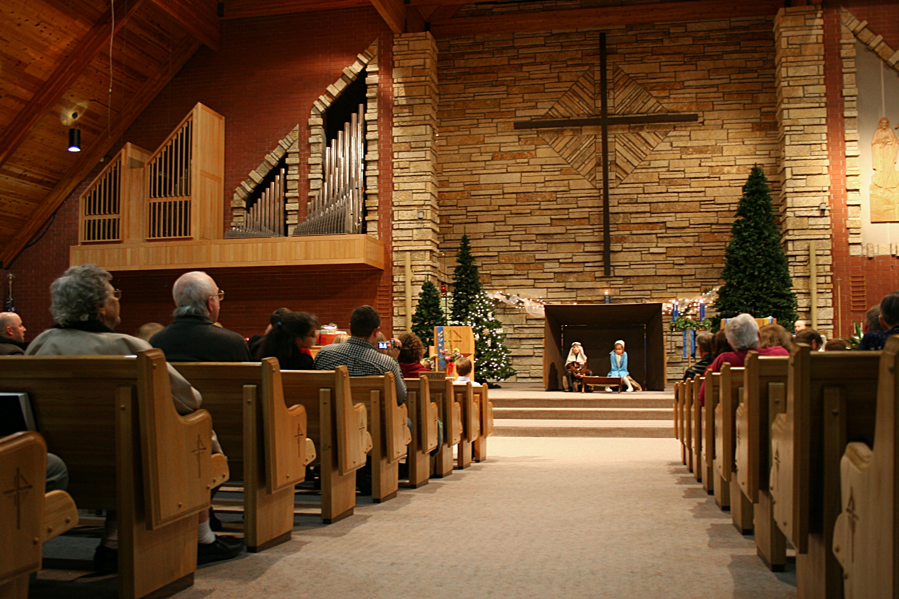 Sunday School students at Trinity Lutheran Church, Faribault, present the Christmas story Saturday evening.