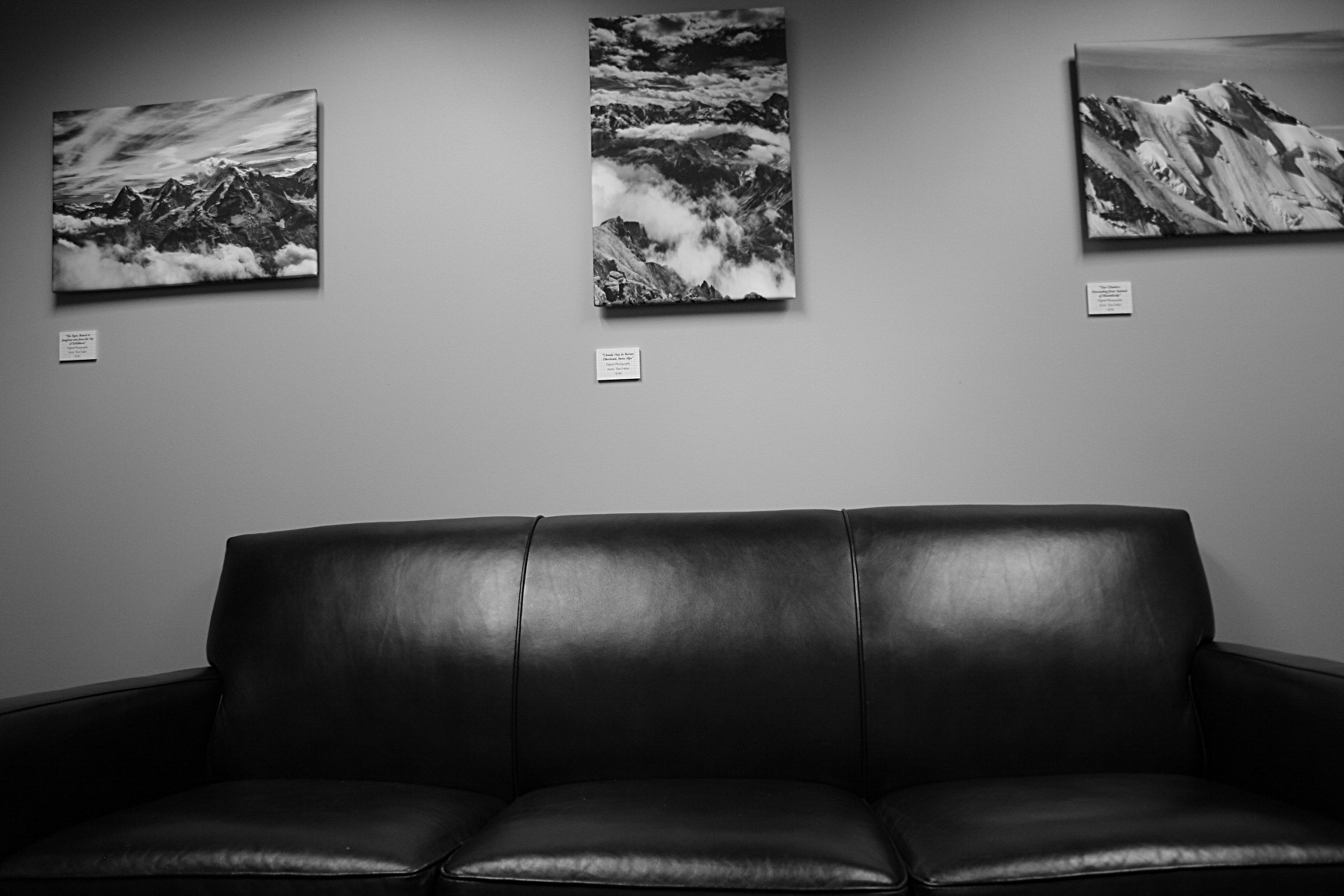 A photo in a cozy private waiting room fronts Tom Fakler's Swiss Alps photos.