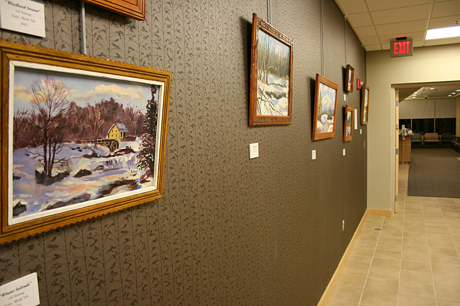 Twenty-five of Rhody Yule's oils grace the hall and patient rooms in the cancer center.