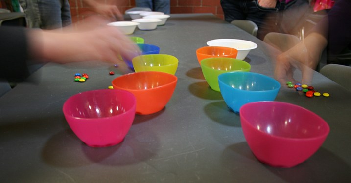 Racing to sort M & Ms by color is not as easy as it looks.