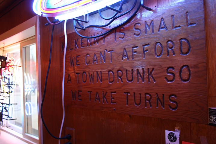 Kilkenny bar humor posted below the Bud Light sign.